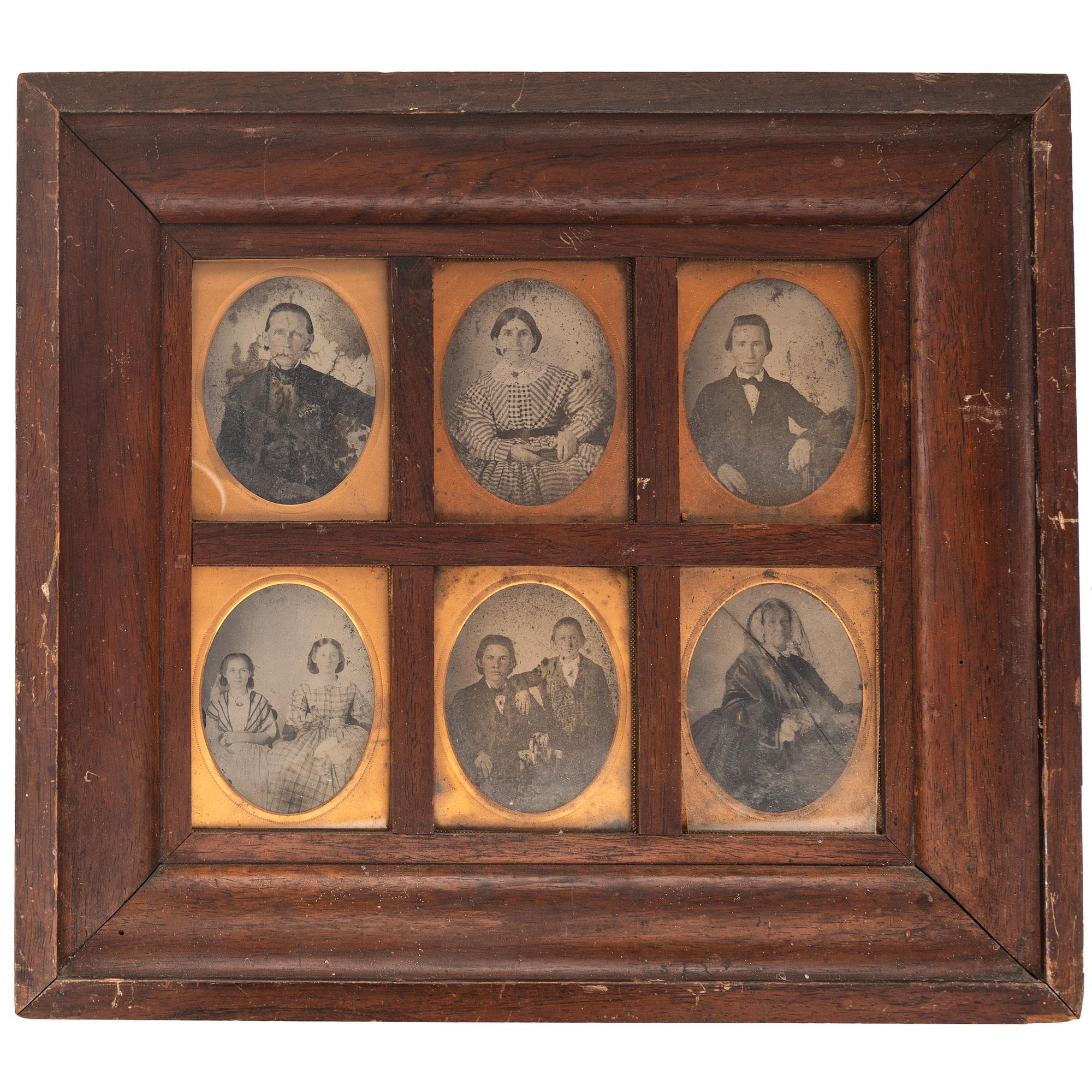 [EARLY PHOTOGRAPHY - PORTRAITURE]. A Daguerreian wall frame containing 6 quarter plate tintypes, with additional frames and mats, including: