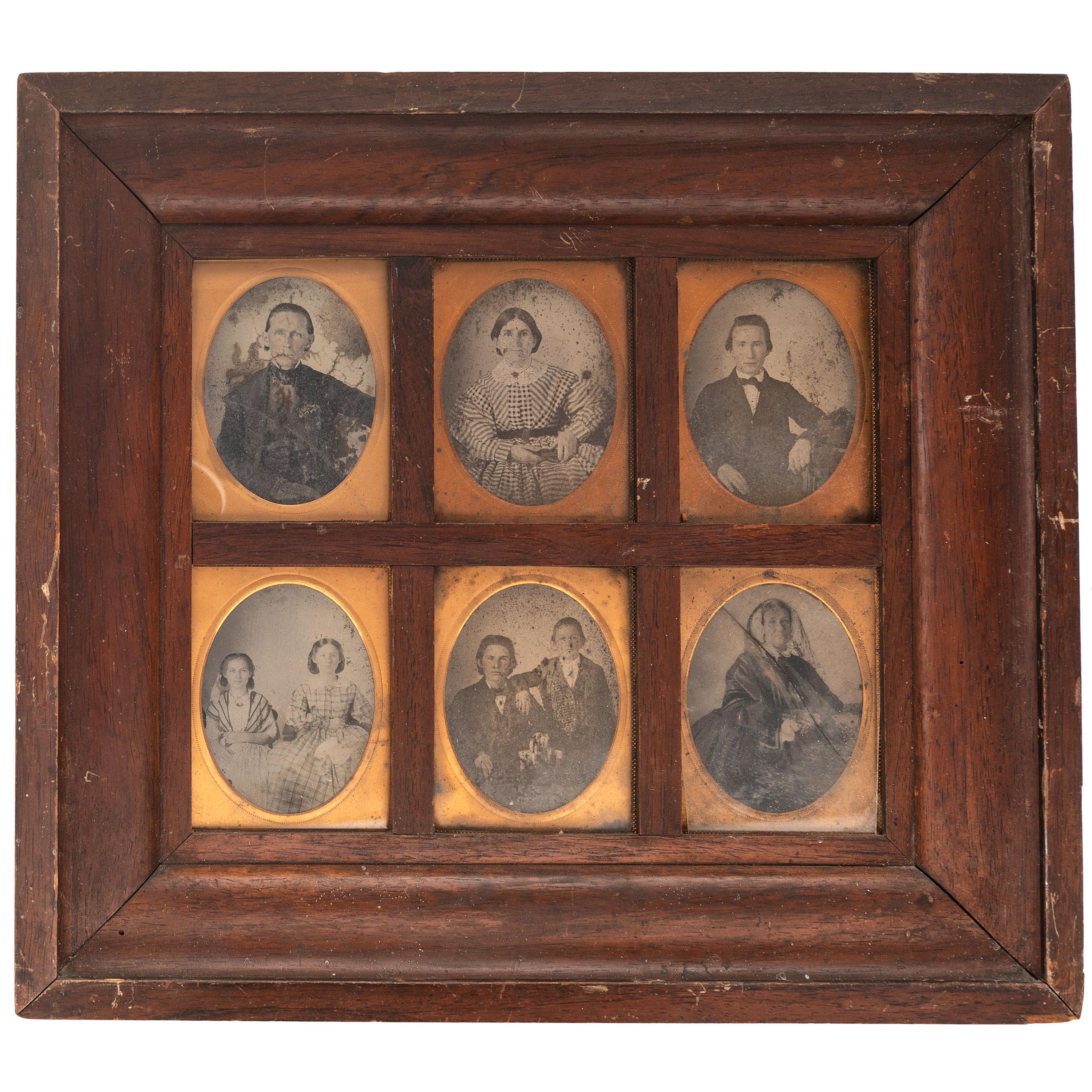 [EARLY PHOTOGRAPHY - PORTRAITURE]. A Daguerreian wall frame containing 6 quarter plate tintypes, with additional frames and mats, including: