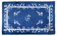 A Chinese Wool Carpet, 7 feet 9 inches x 5 feet 2 inches.