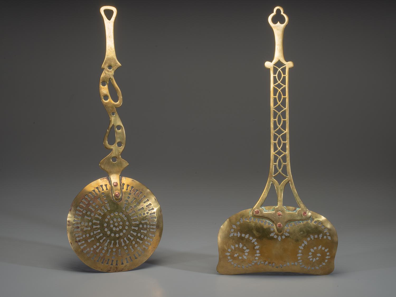 Two Pierced Brass Skimmers