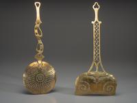 Two Pierced Brass Skimmers