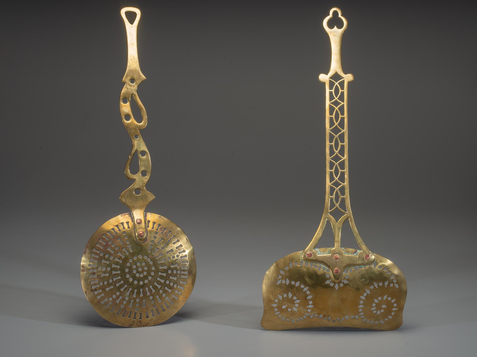 Two Pierced Brass Skimmers