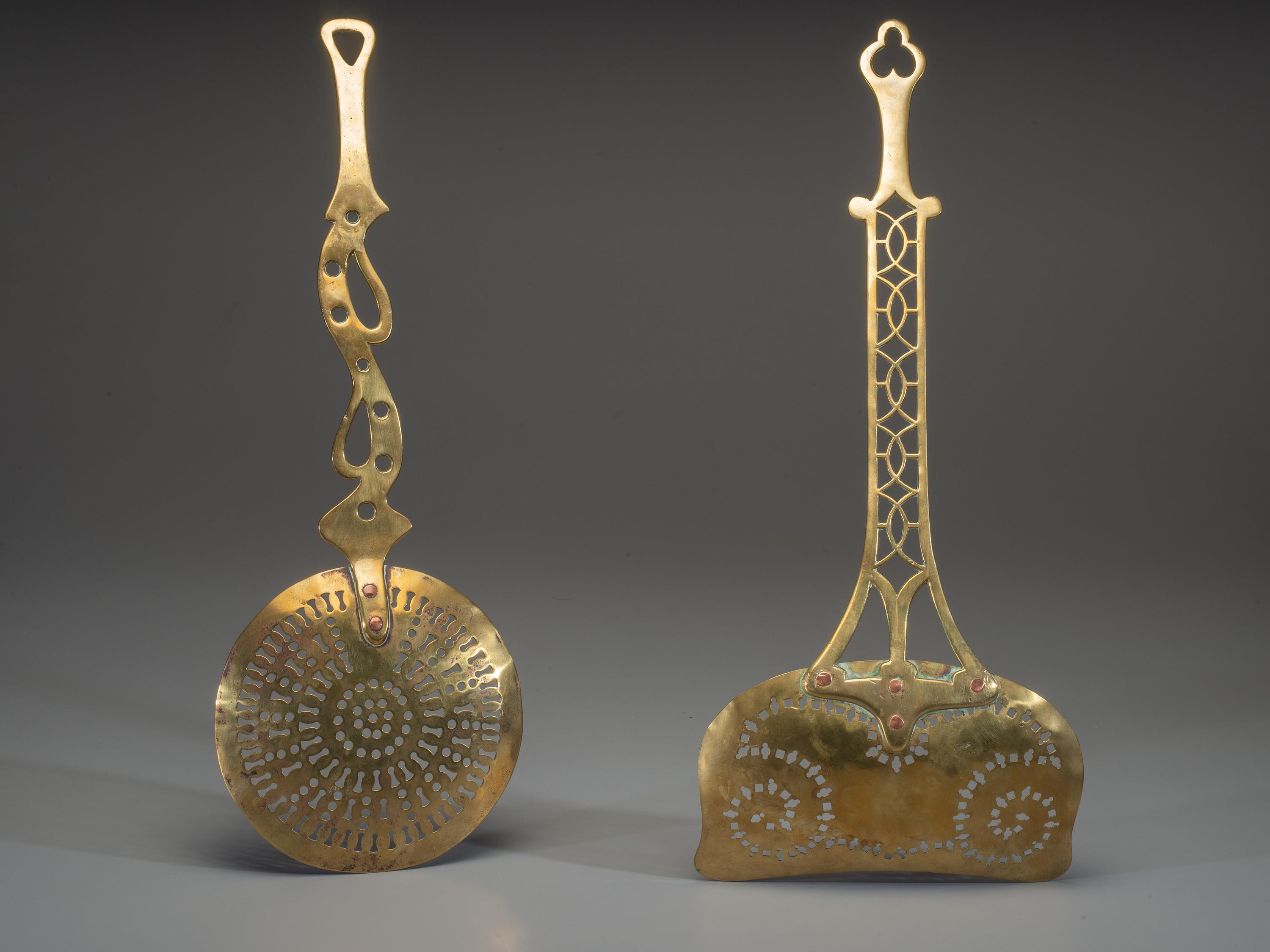 Two Pierced Brass Skimmers