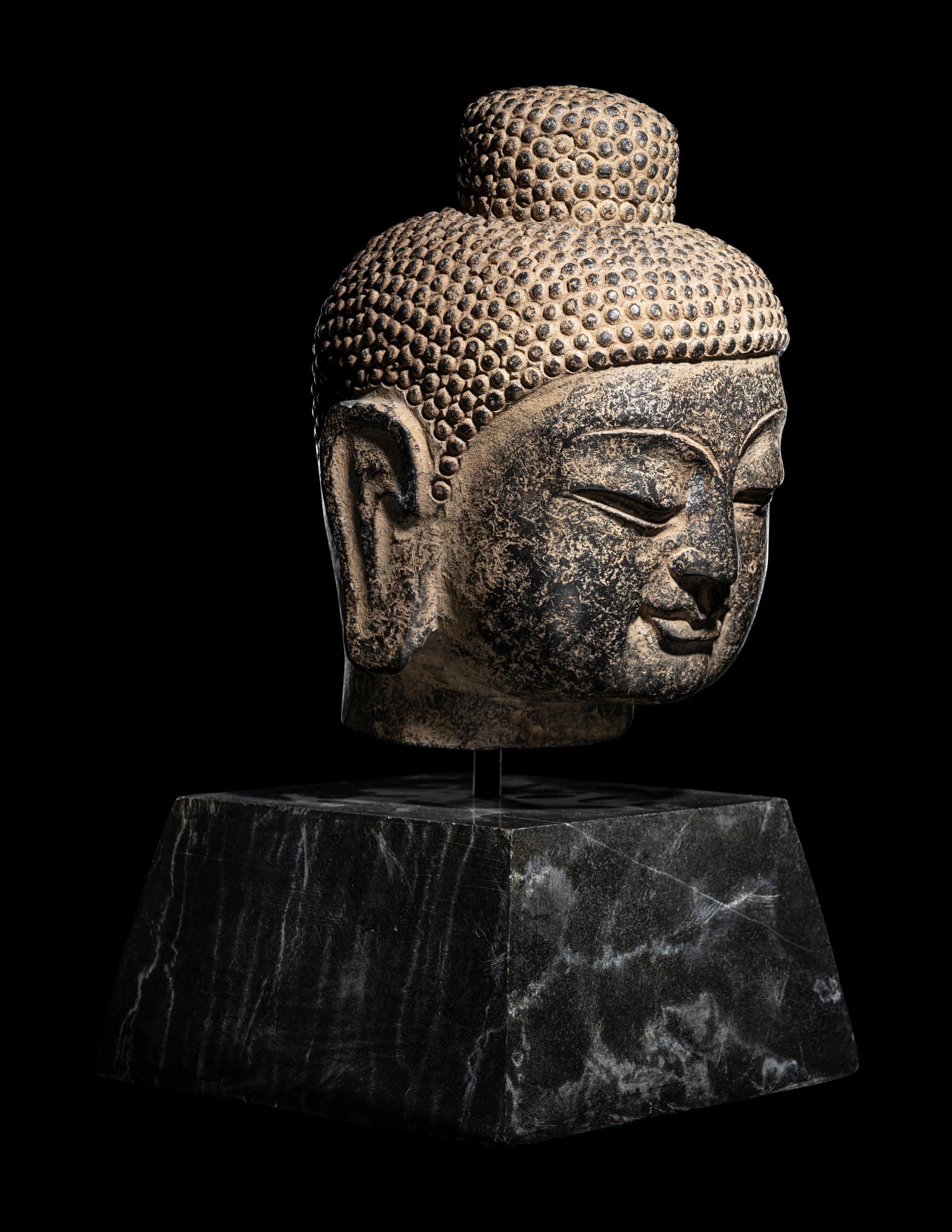 A Chinese Carved Stone Head of Buddha
