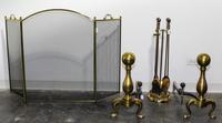 An Assembled Suite of Brass Fireplace Equipment Height of andirons 21 1/4 inches. — 20TH CENTURY
