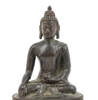 A Tibetan Bronze Figure of Seated Buddha Akshobhya
