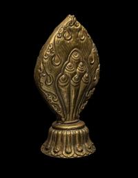 A Nepalese Repoussé Gilt Bronze Flaming Jewel Altar Piece