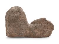 A Carved Granite Figure of a Reclining Lion — 19TH/20TH CENTURY