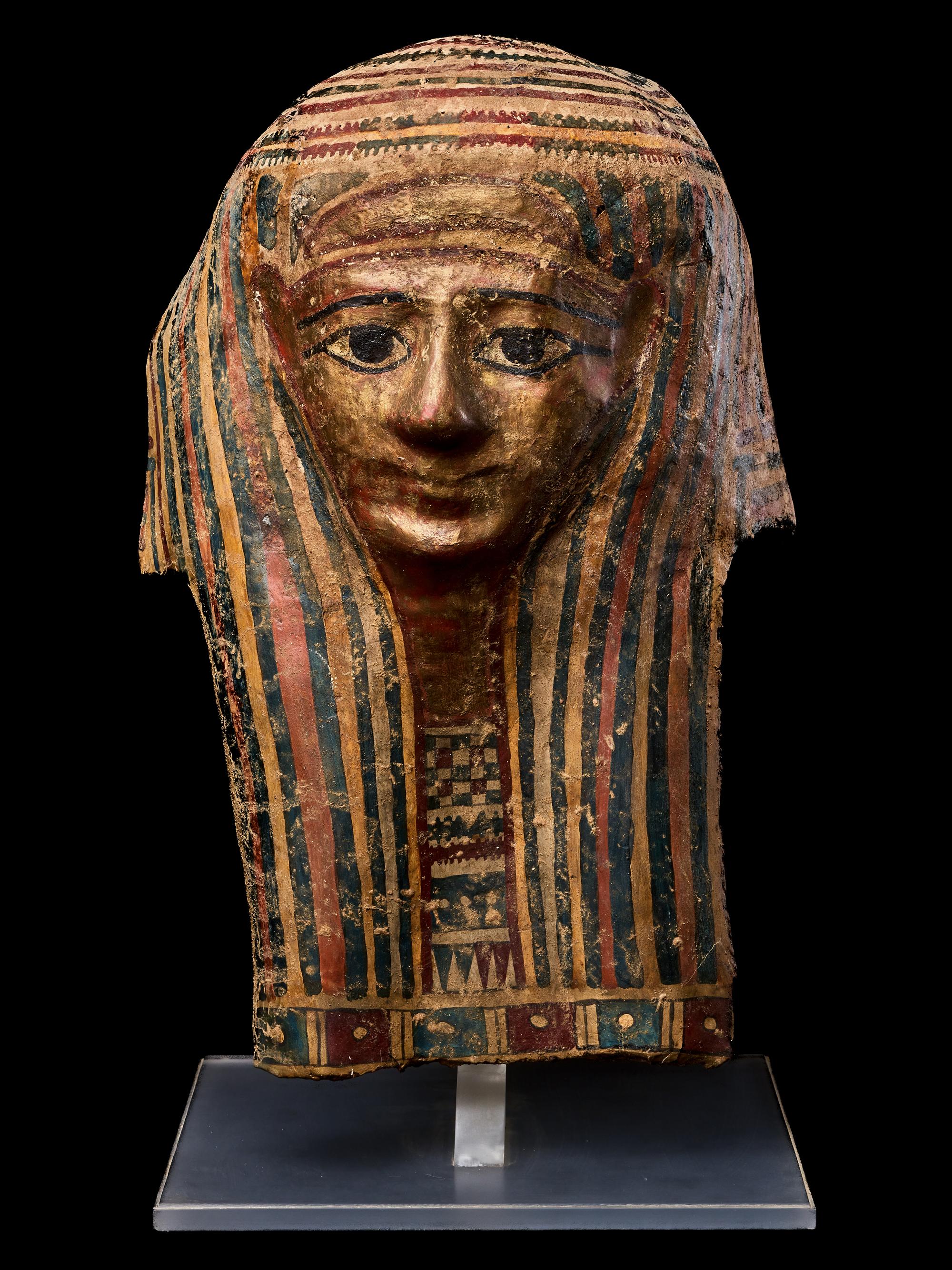 An Egyptian Cartonnage Mummy Mask