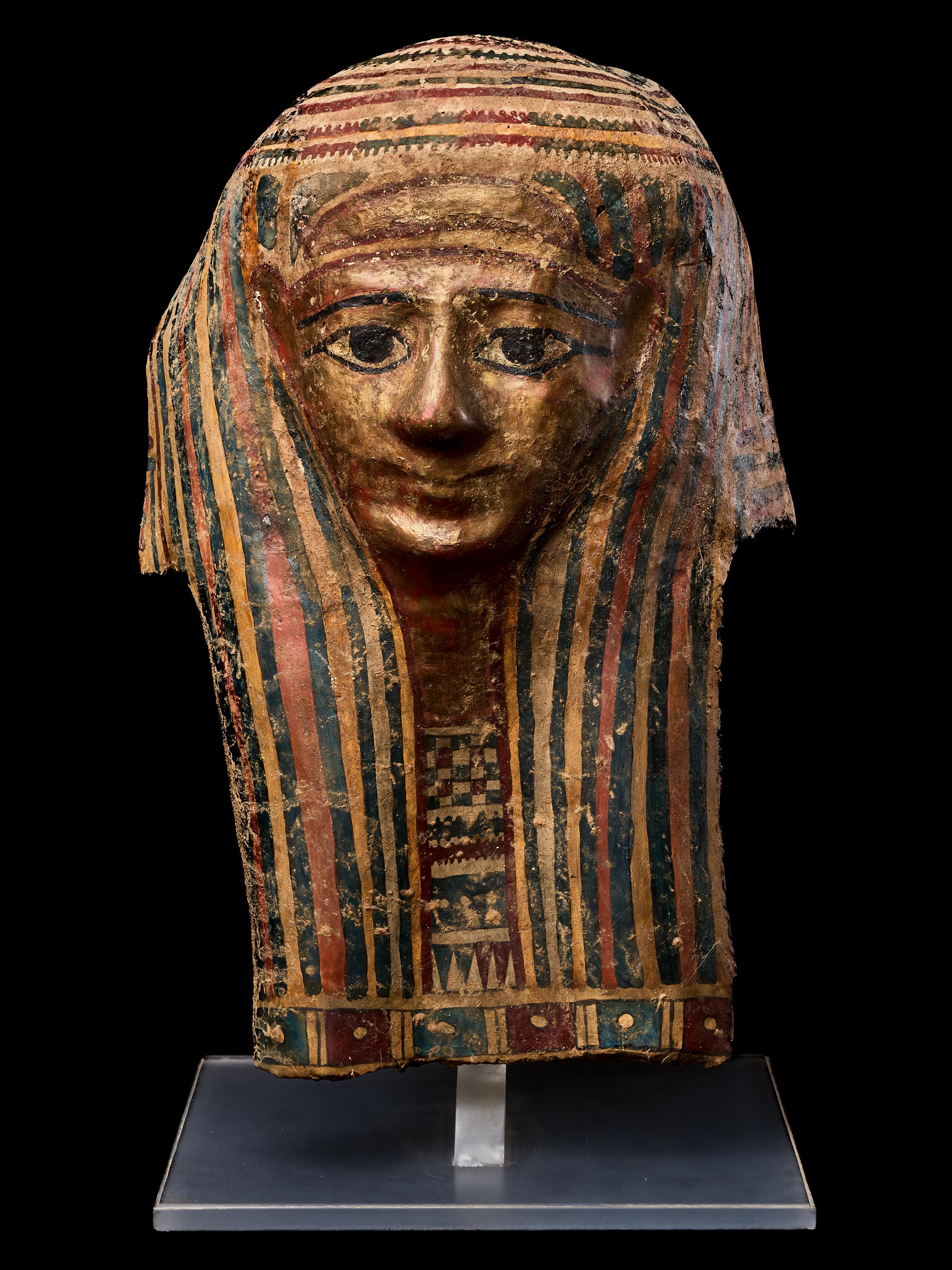 An Egyptian Cartonnage Mummy Mask