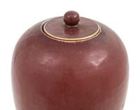 A Pair of Chinese Sang-de-Boeuf Porcelain Covered Jars