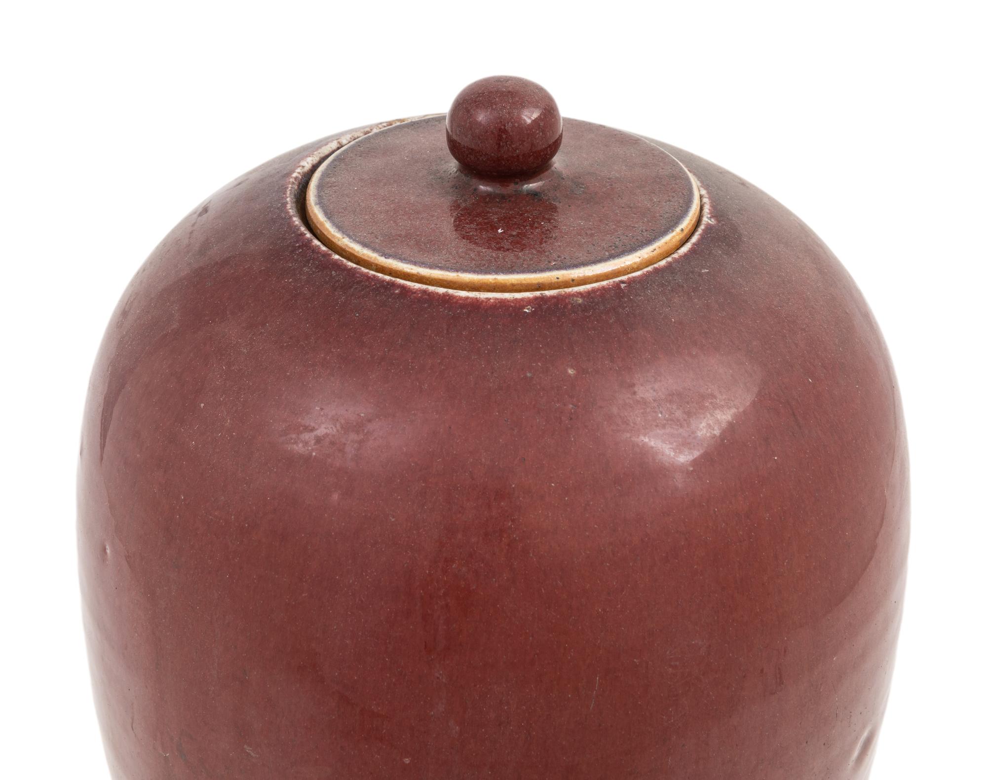 A Pair of Chinese Sang-de-Boeuf Porcelain Covered Jars
