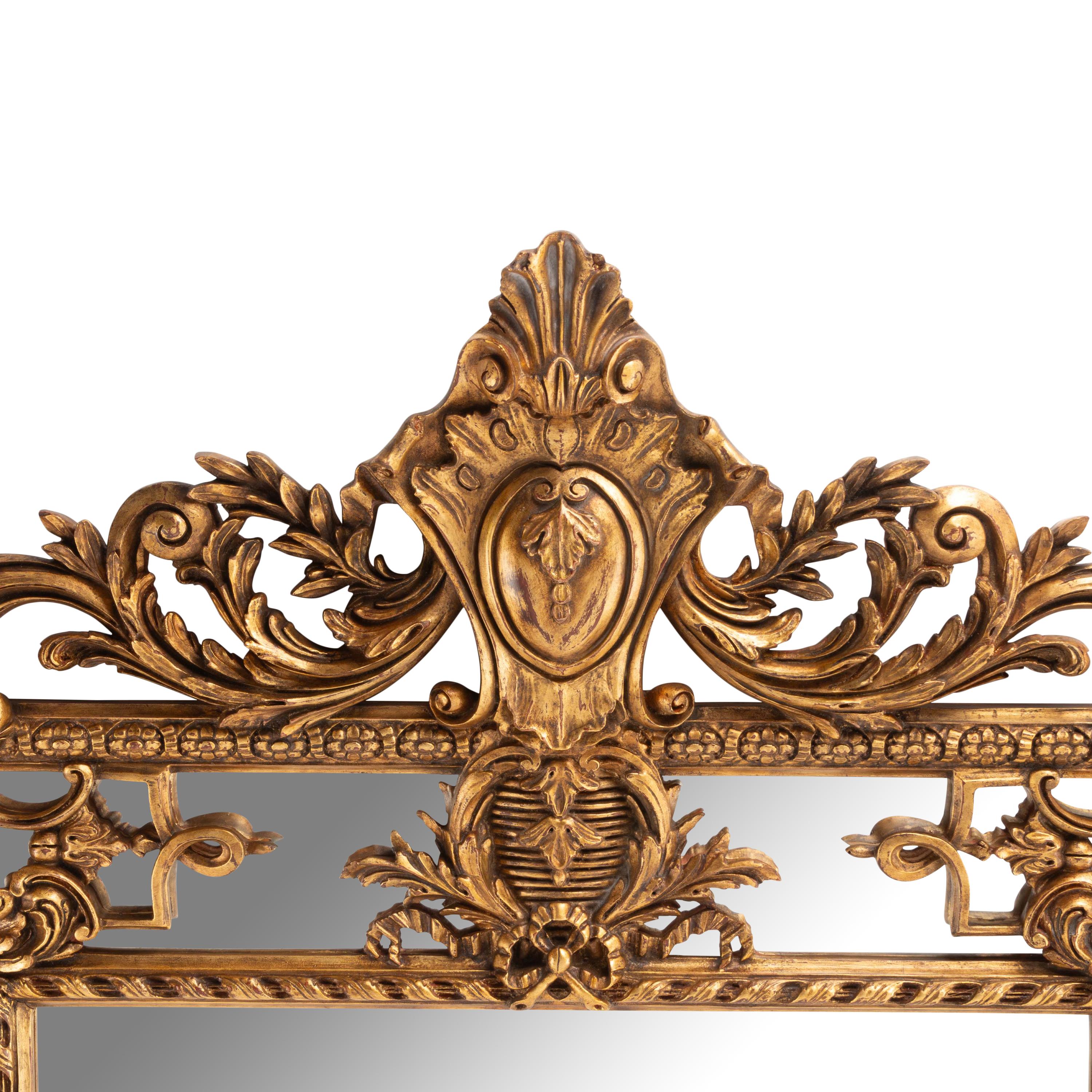 A Pair of Large Régence Style Giltwood Mirrors