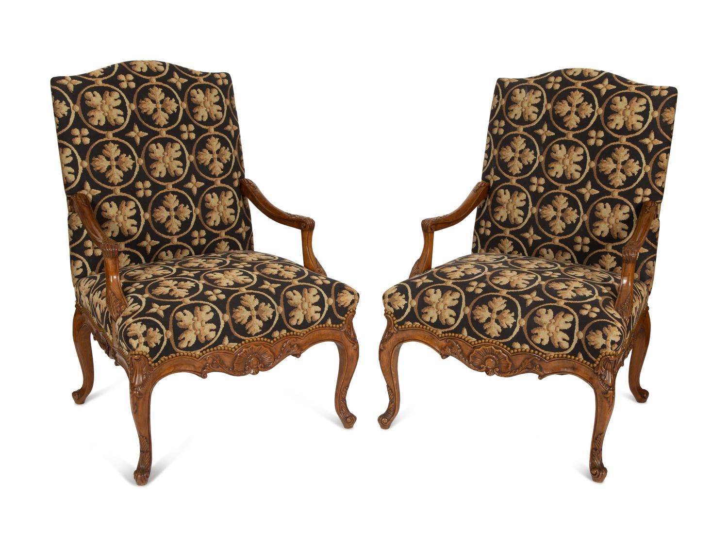 A Pair of Régence Style Upholstered Fauteuils