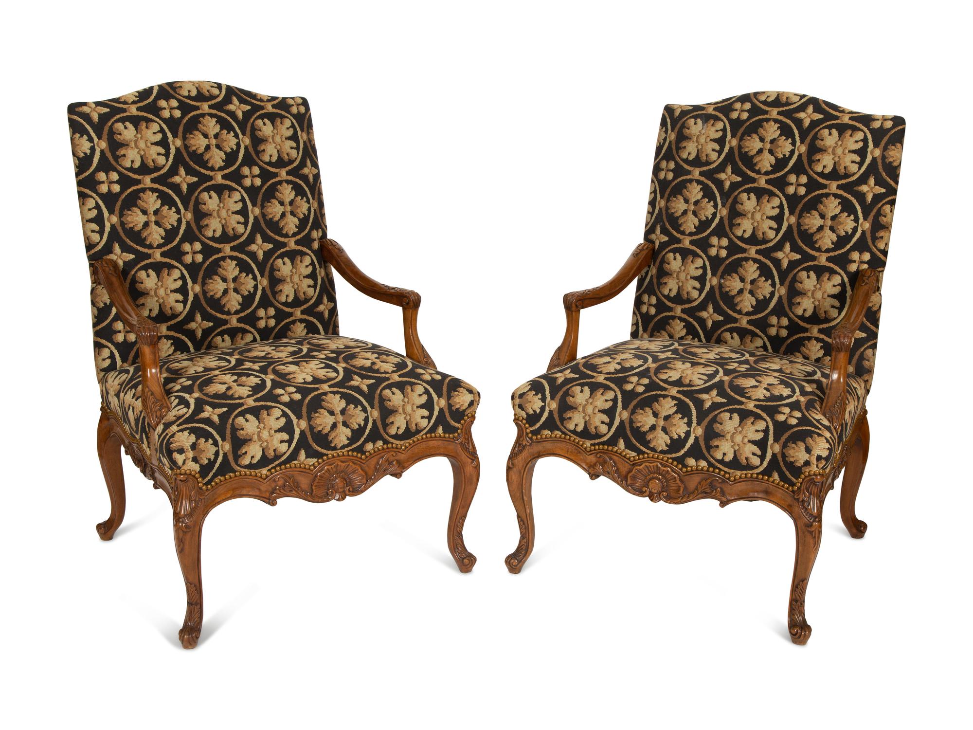 A Pair of Régence Style Upholstered Fauteuils