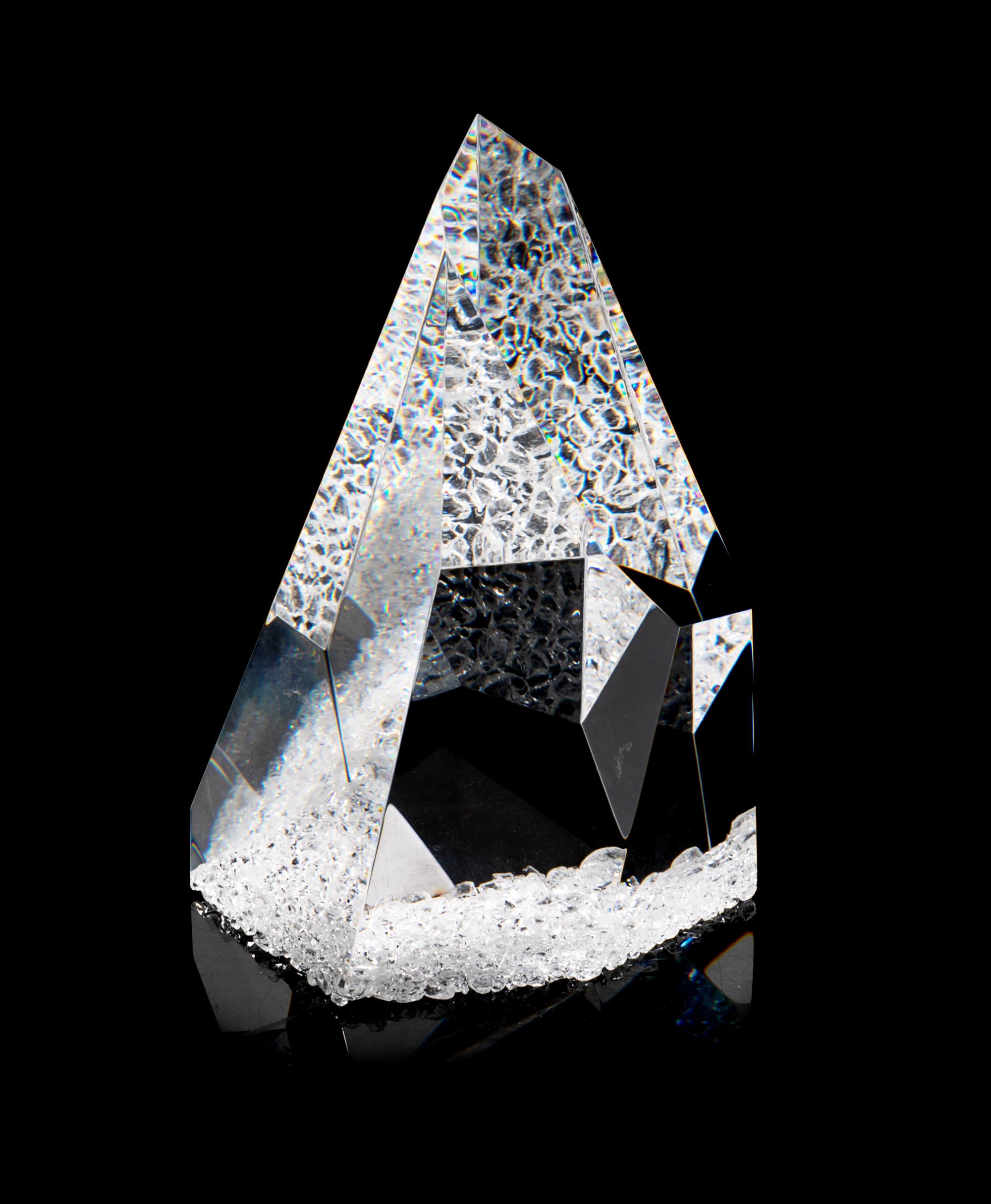 A Steuben Sculpture Height 7 5/8 inches.
