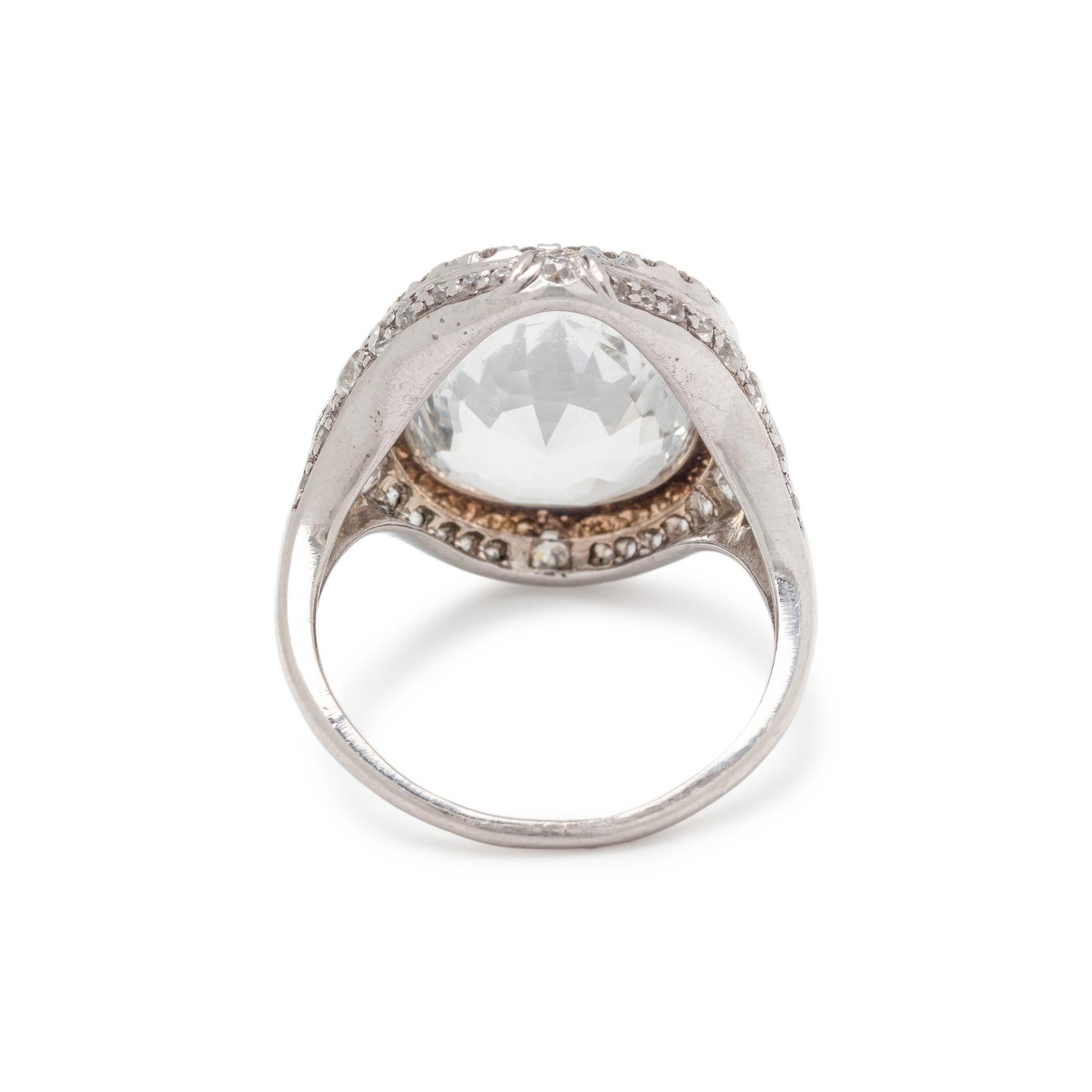 COLORLESS SAPPHIRE AND DIAMOND RING