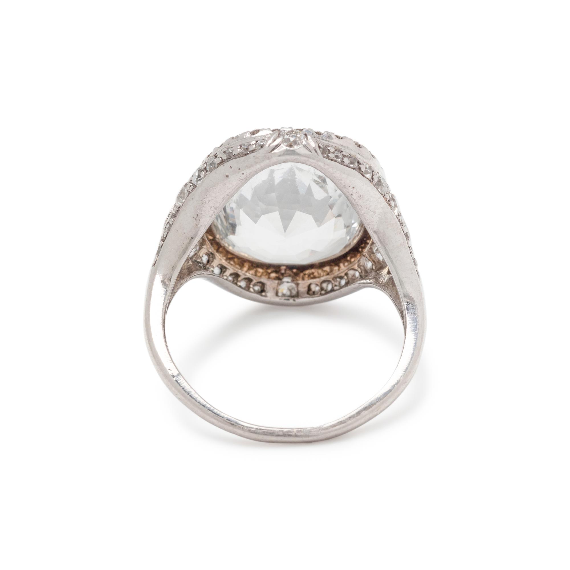 COLORLESS SAPPHIRE AND DIAMOND RING