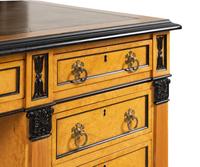 A Russian Neoclassical Style Birch and Parcel Ebonized Partner's Desk