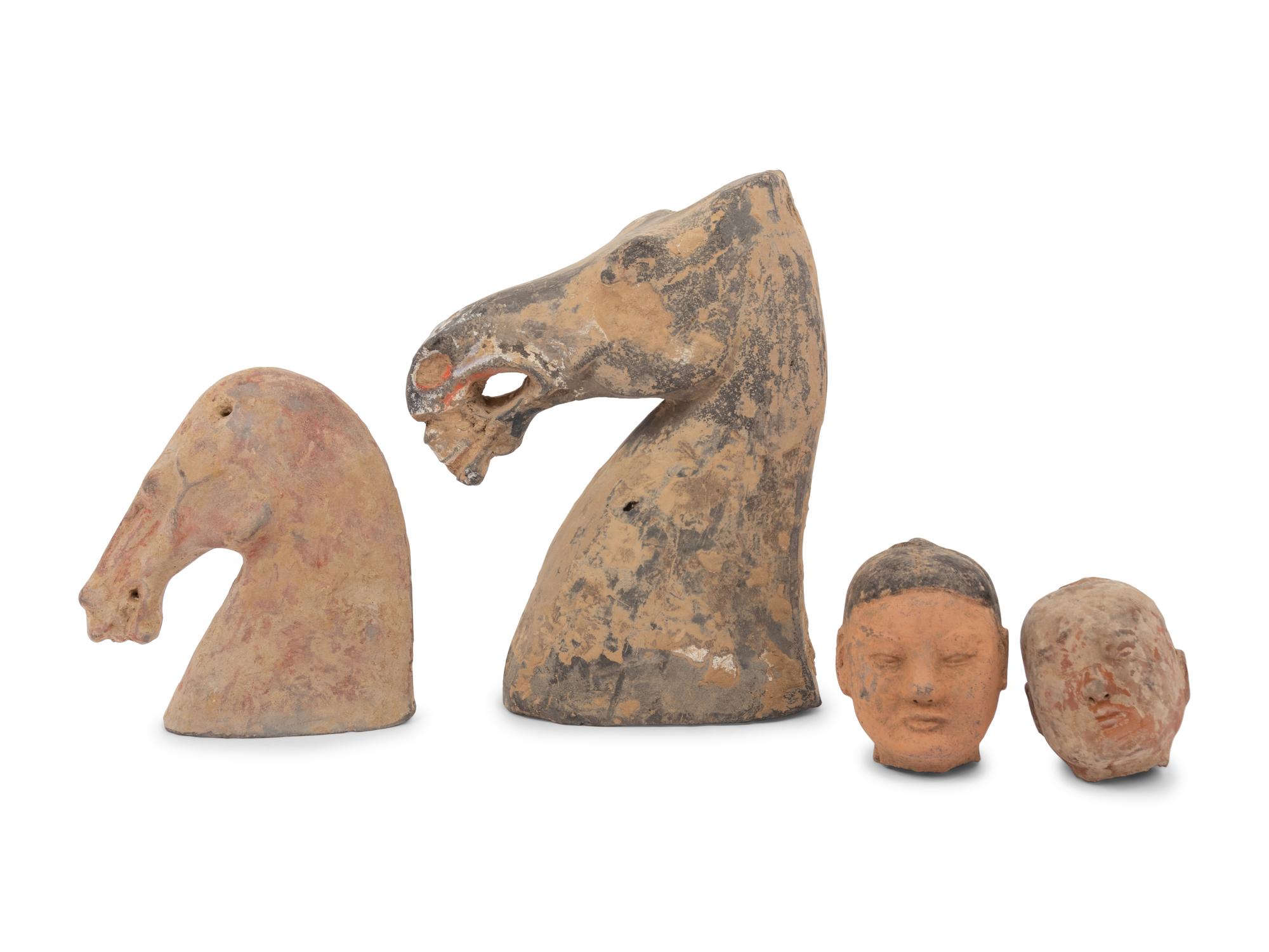 Four Chinese Pottery Heads