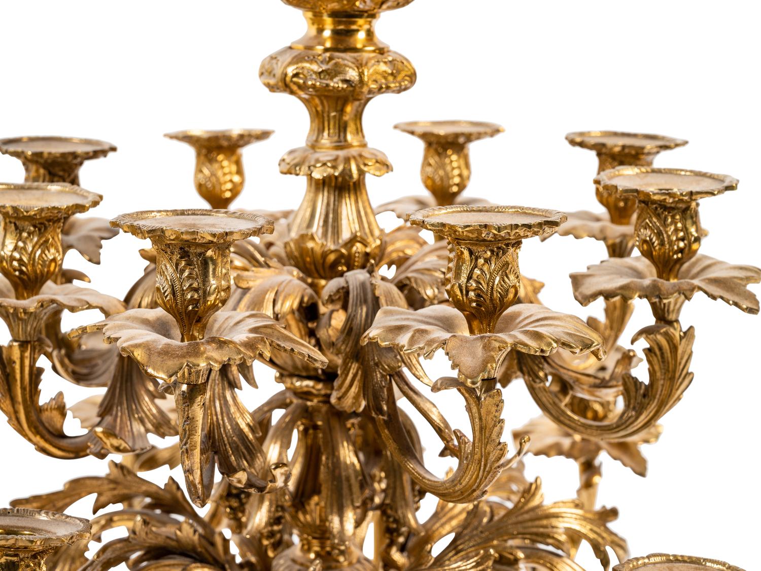 A Pair of Continental Gilt Metal Sixteen-Light Candelabra