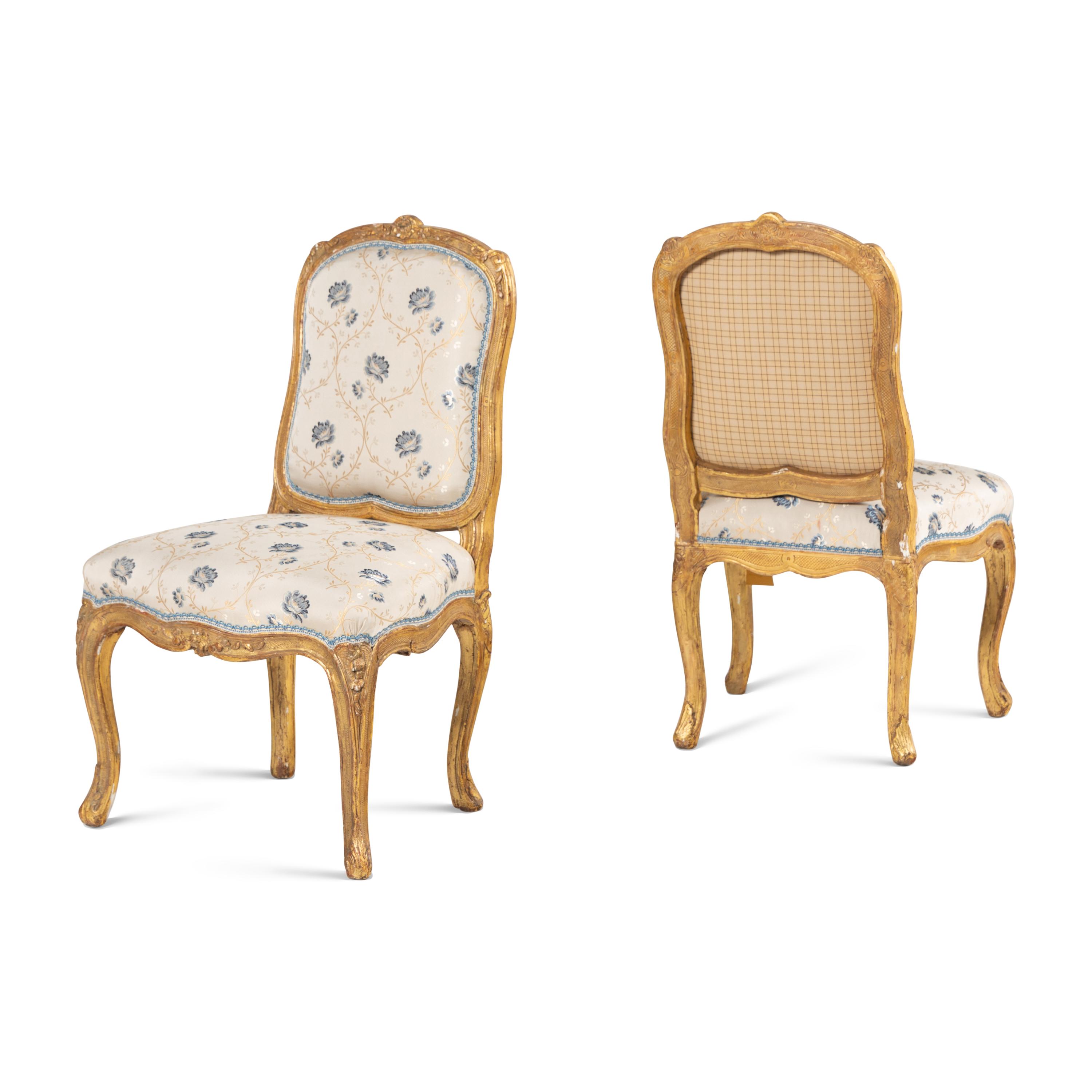 A Pair of Louis XV Carved Giltwood Chaises à la Reine