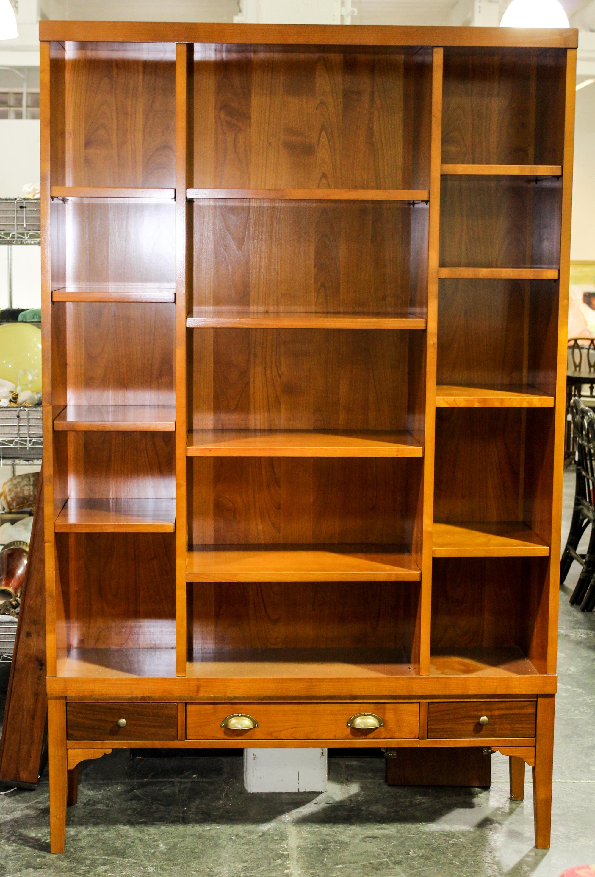 A French Bookcase. Height 83 1/2 x width 53 x depth 14 1/2 inches.