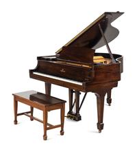 A Steinway and Sons Mahogany Baby Grand Piano