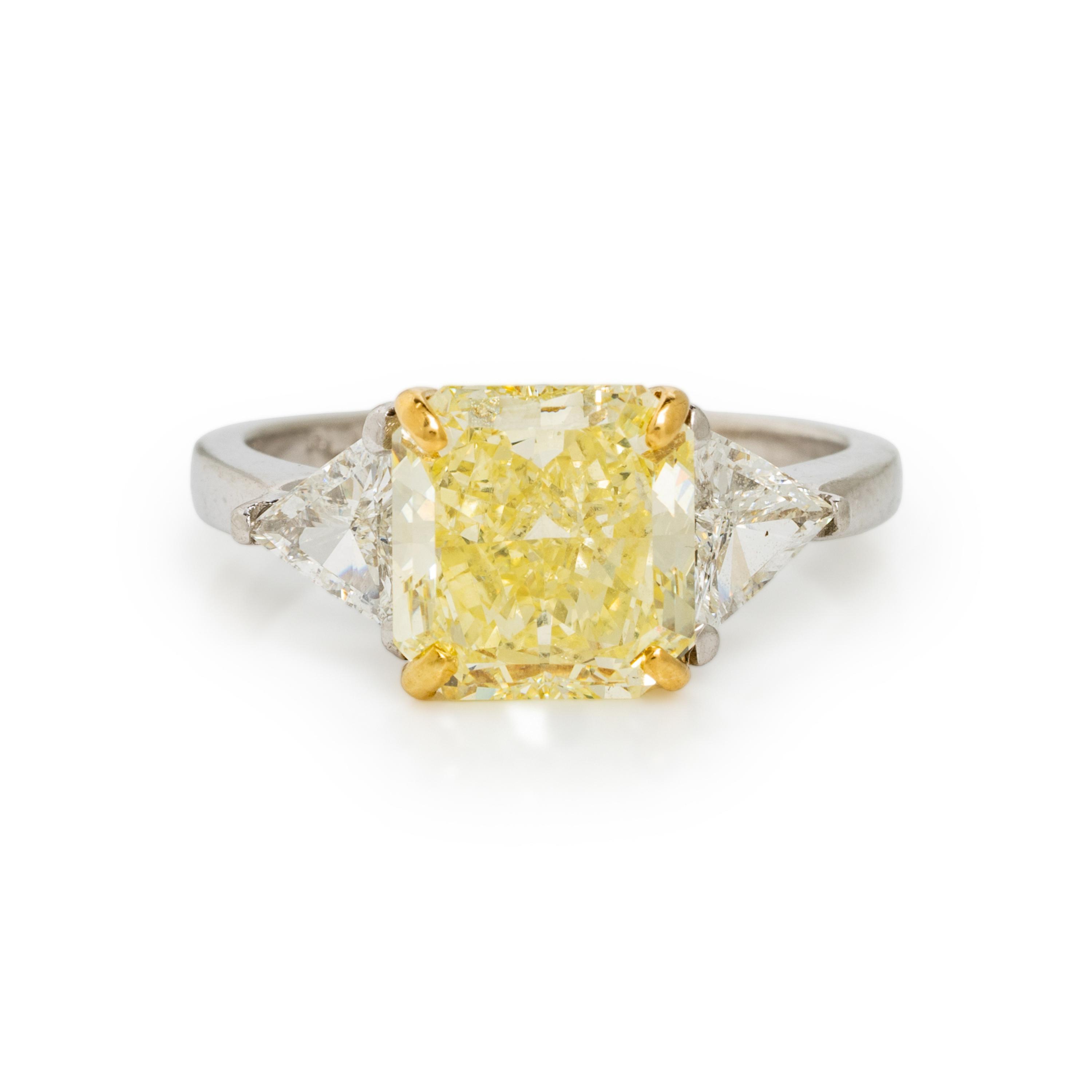FANCY YELLOW DIAMOND, DIAMOND, AND PLATINUM RING