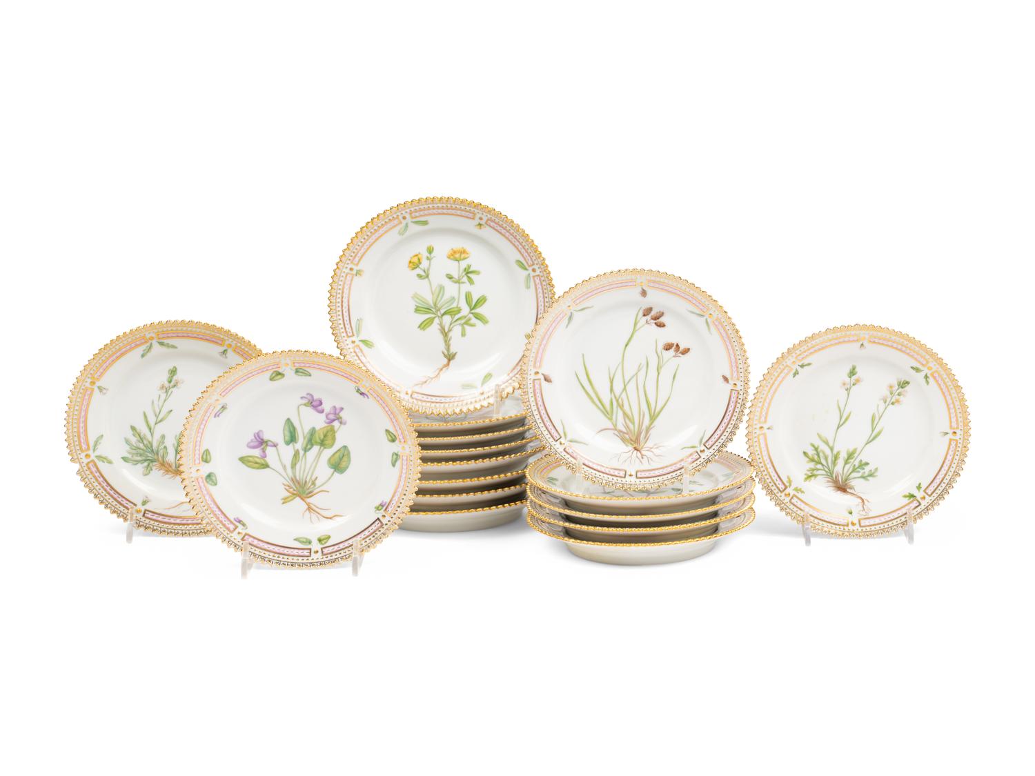 A Set of Sixteen Royal Copenhagen Flora Danica Porcelain Bread Plates