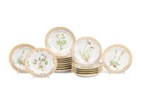A Set of Sixteen Royal Copenhagen Flora Danica Porcelain Bread Plates