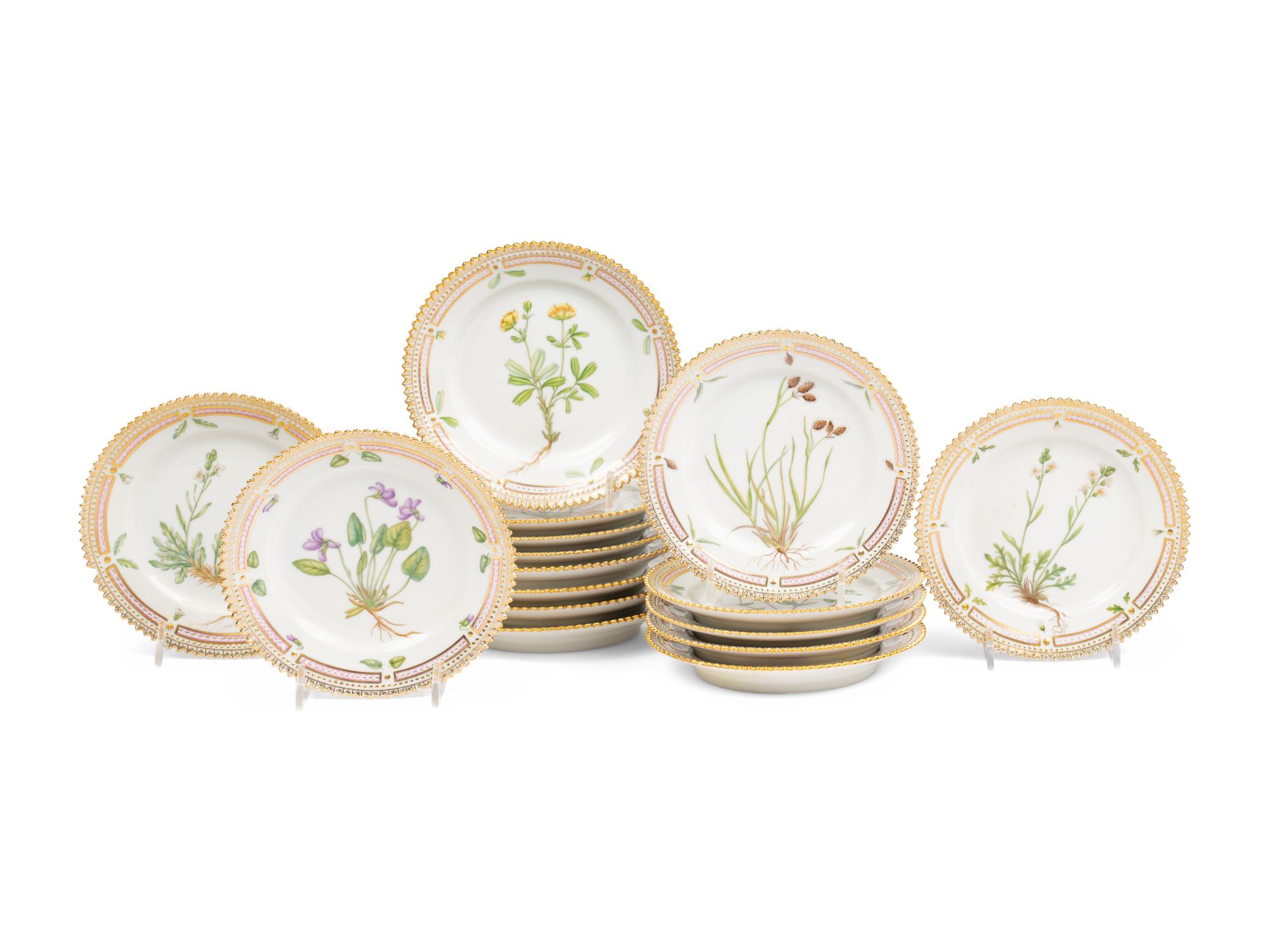 A Set of Sixteen Royal Copenhagen Flora Danica Porcelain Bread Plates