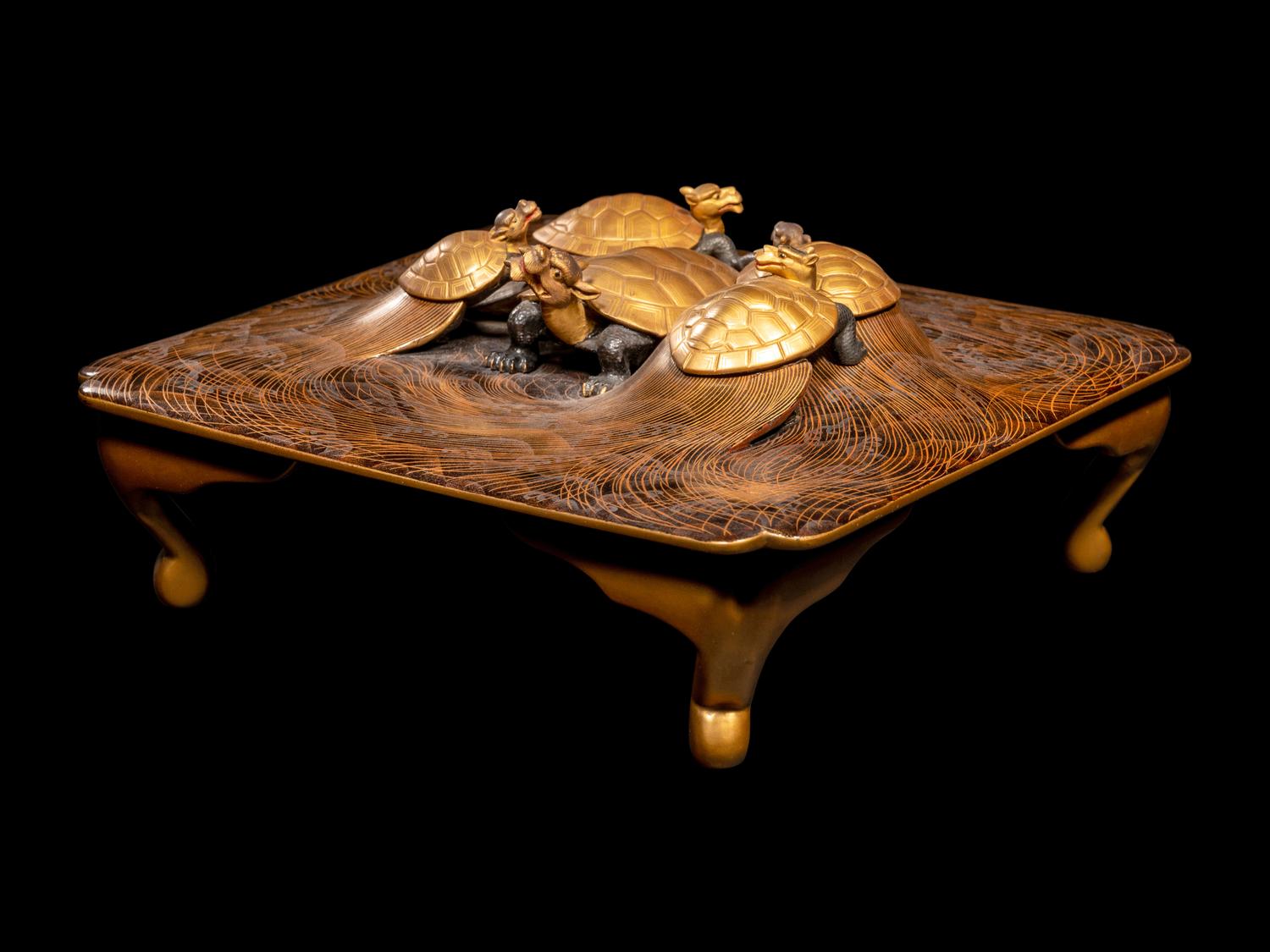 A Japanese Gold and Black Lacquer 'Dragon Turtle' Square Stand