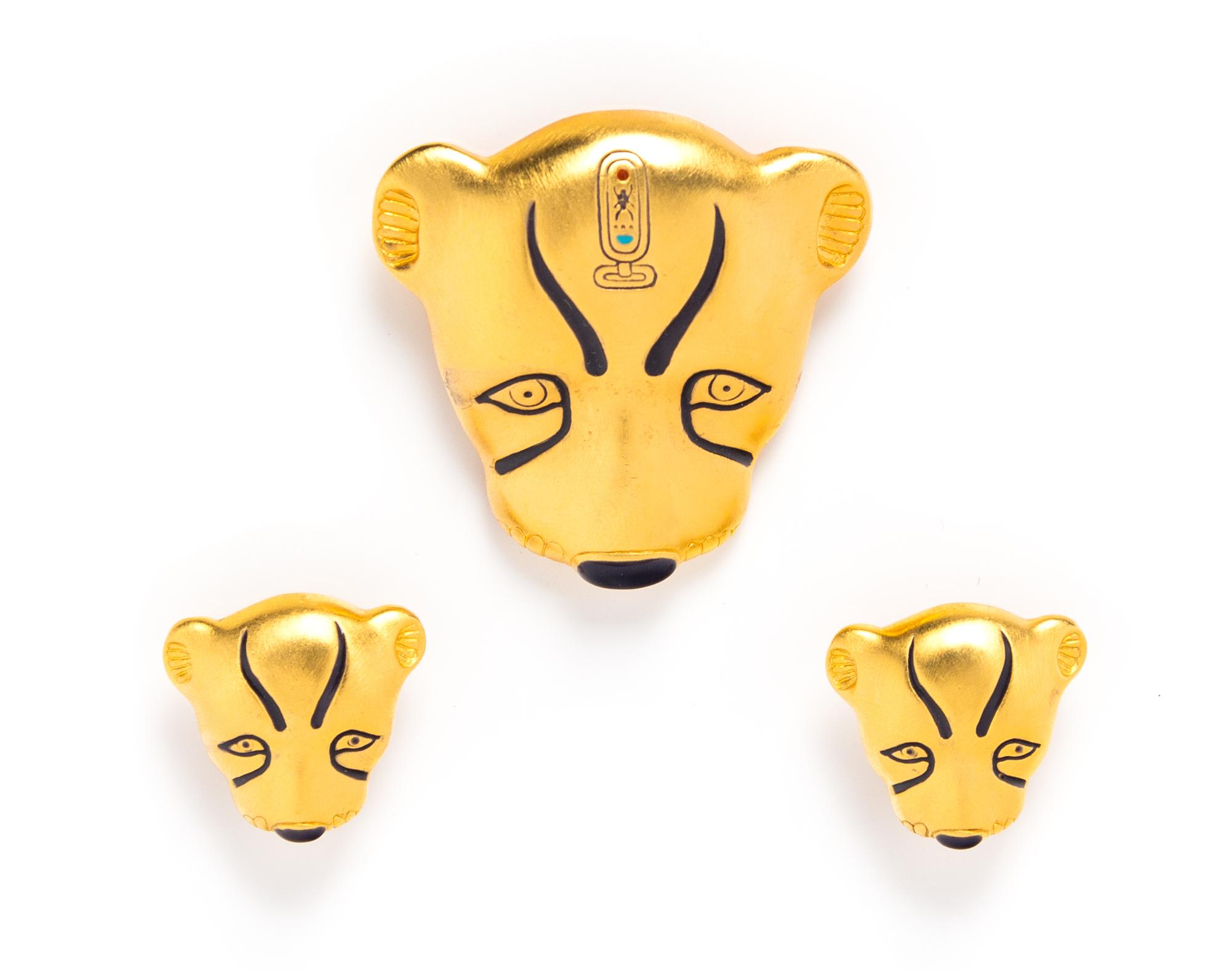 A Brushed Goldtone Leopard Motif Brooch and Earclip Set, Brooch 1.75" x 2", earclip .75" x .75".