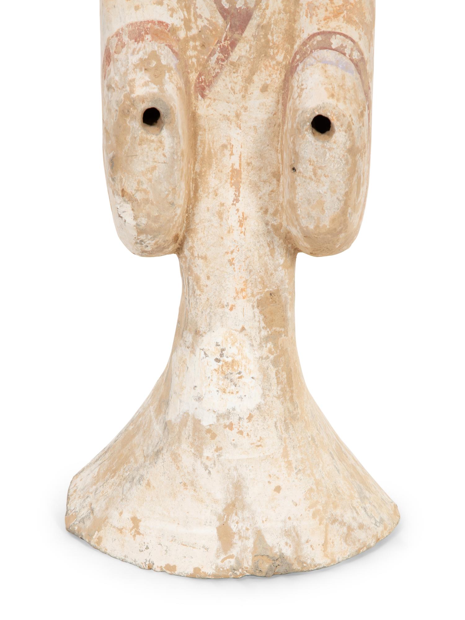 A Han Pottery Figure of a Lady