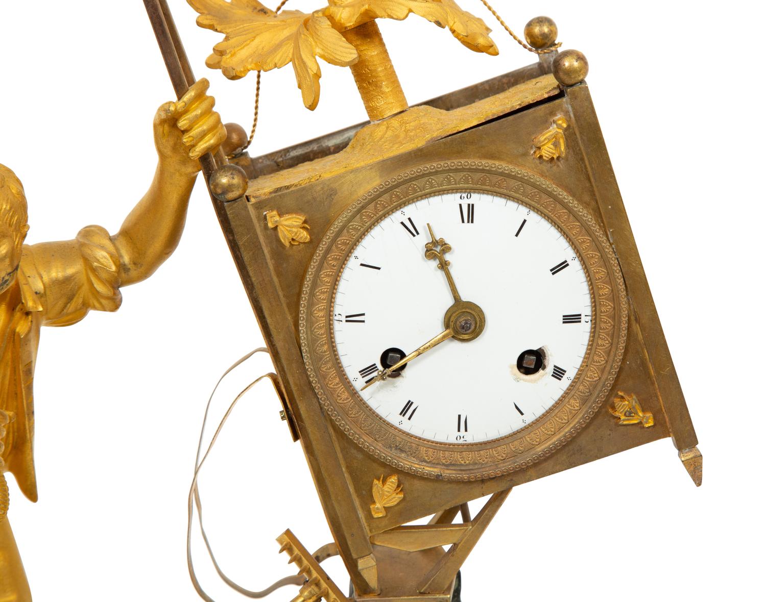 A Restauration Gilt and Patinated Bronze "Gardener" Clock