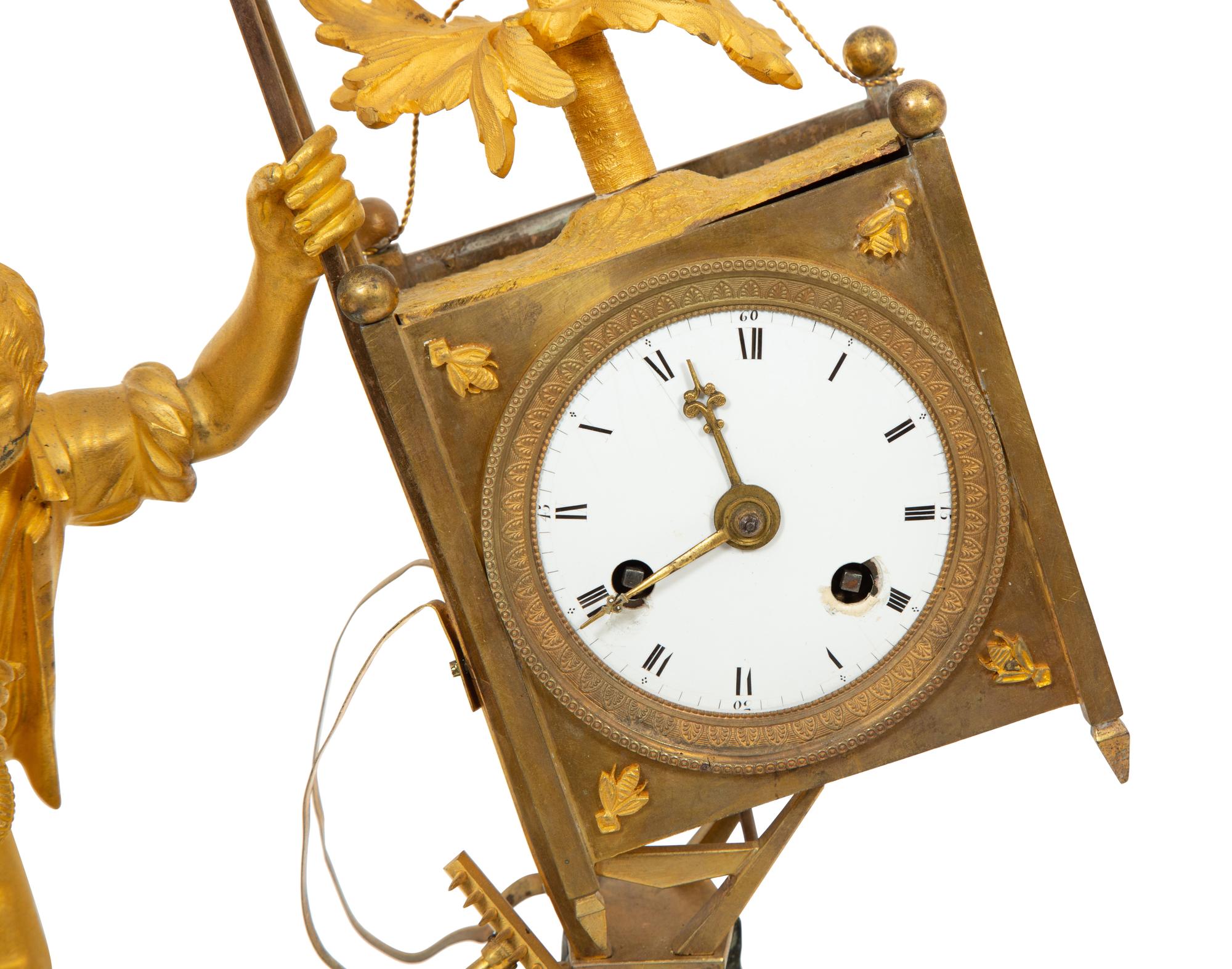 A Restauration Gilt and Patinated Bronze "Gardener" Clock