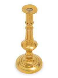 A Collection of Fifteen English Brass Diminutive Candlesticks and Tapersticks