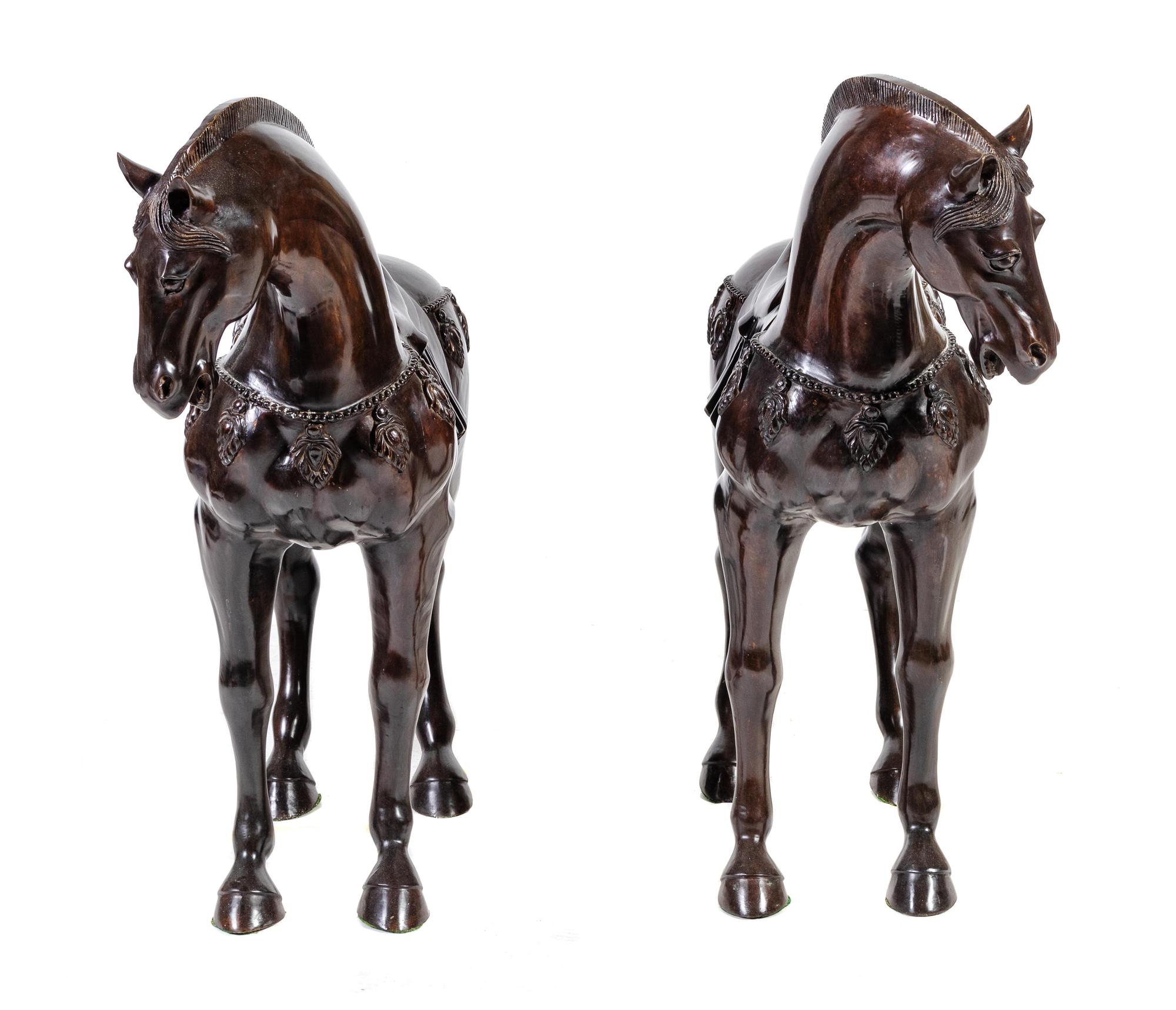 A Pair of Bronze Models of Horses