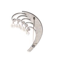 MARSH & CO., ART MODERNE, BLACKENED STEEL, CULTURED PEARL AND DIAMOND BROOCH