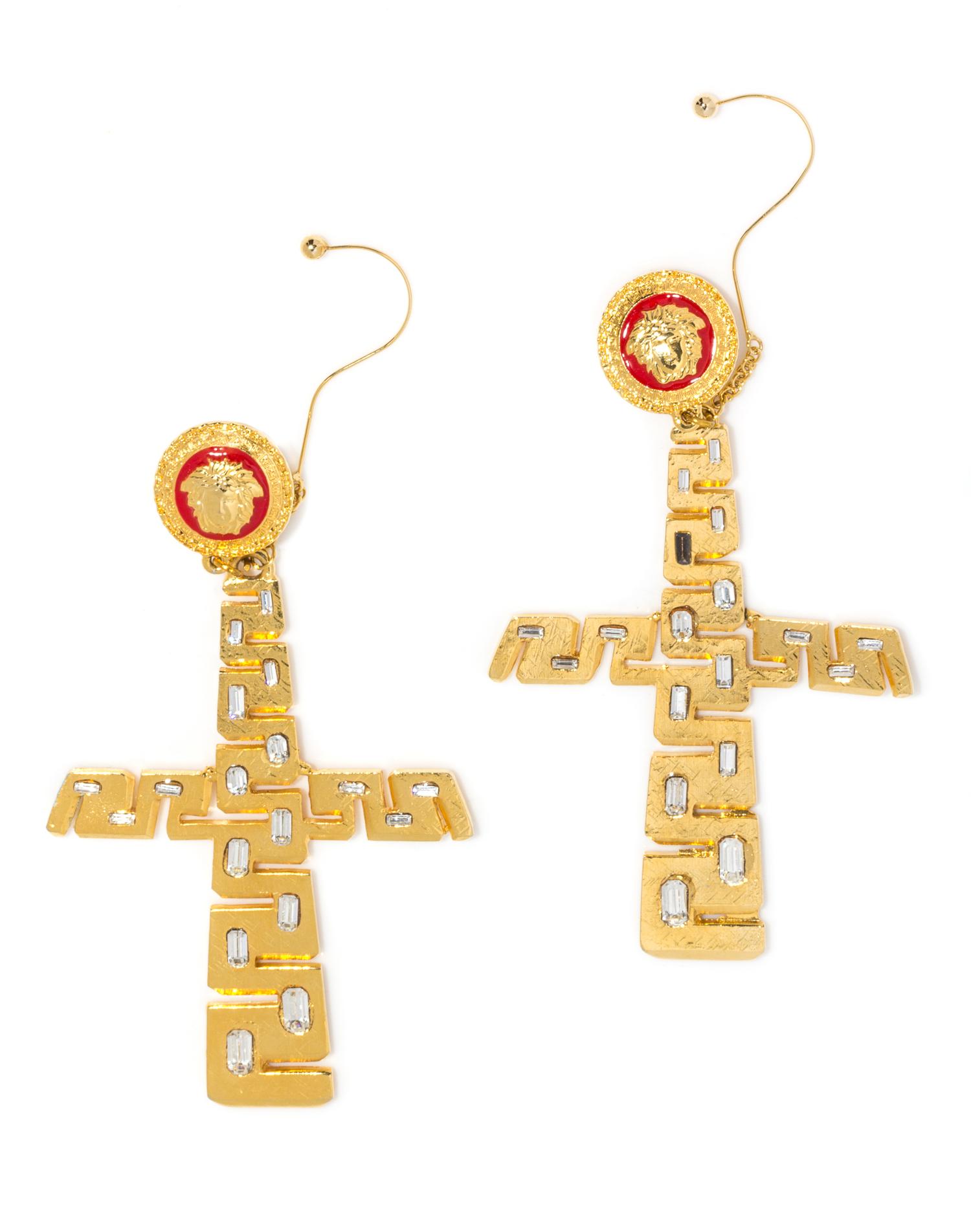 A Pair of Gianni Versace Cross and Rhinestone Runway Earclips, Medallion: 1.25" x 1.25"; Cross: 4.5" x 3.75"; Drop: 6.25".