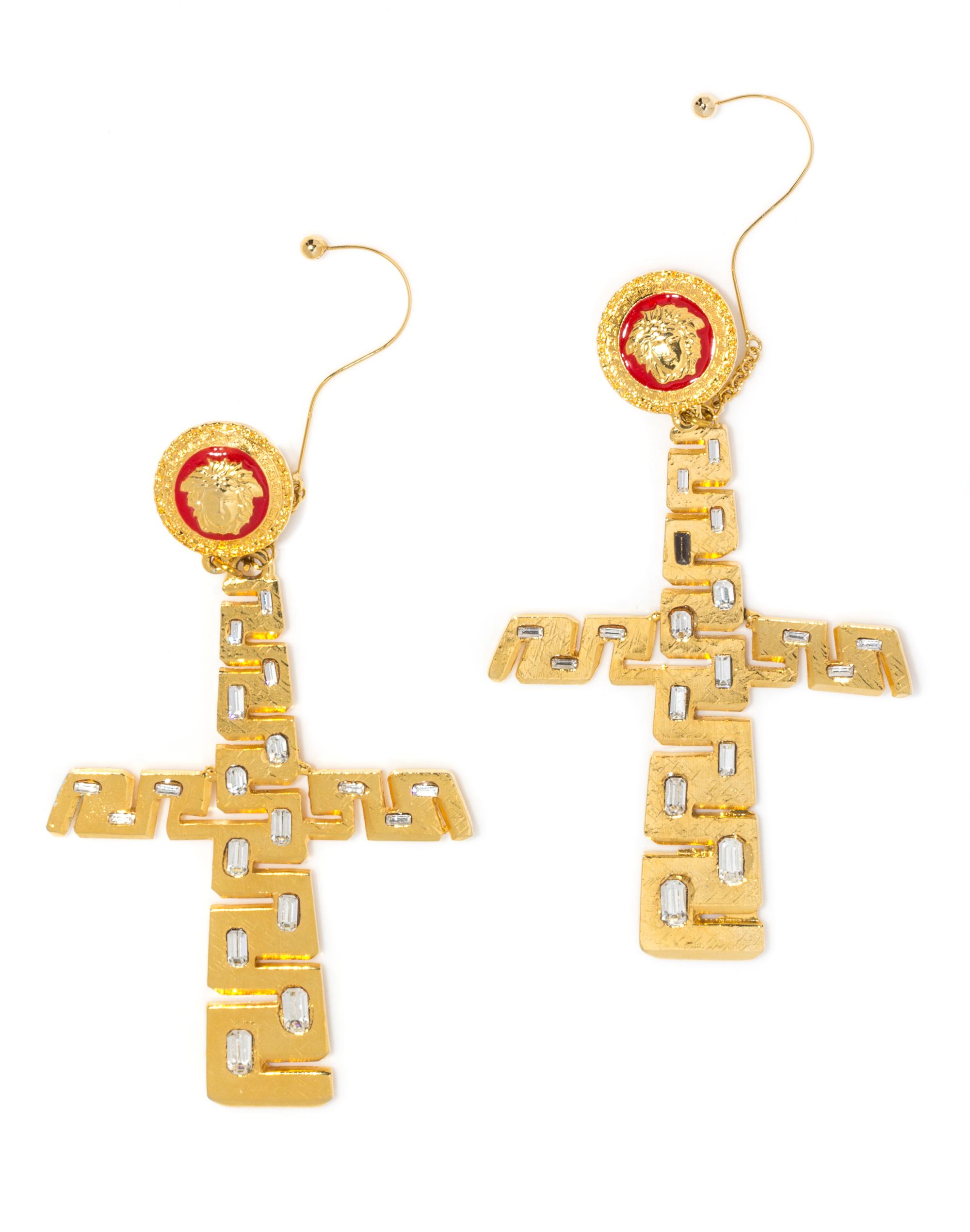 A Pair of Gianni Versace Cross and Rhinestone Runway Earclips, Medallion: 1.25" x 1.25"; Cross: 4.5" x 3.75"; Drop: 6.25".