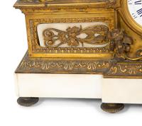 A Louis XV Style Gilt Bronze and Marble Mantel Clock