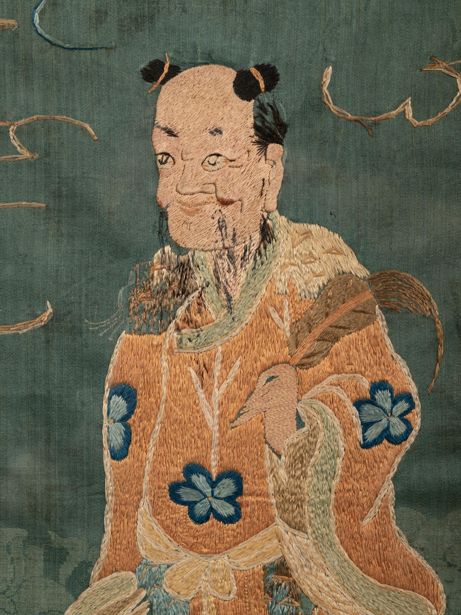 Two Chinese Blue Ground Embroidered Silk Panels