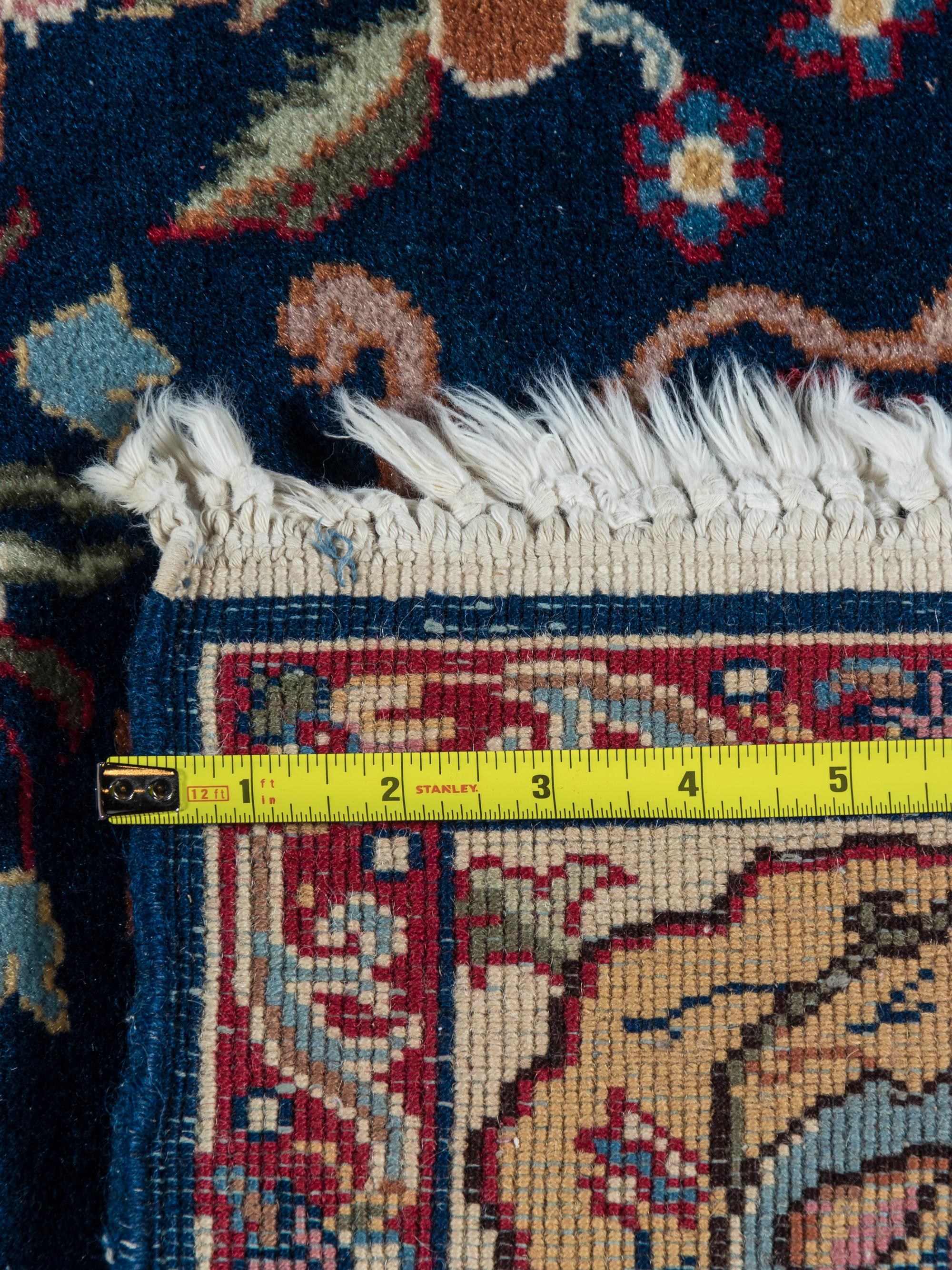 A Tabriz or Qum Wool Rug