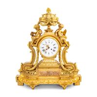 A Louis XVI Style Gilt Bronze Mantel Clock