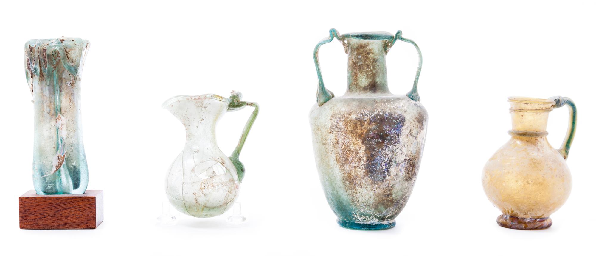 Four Roman Glass Articles Height 5 3/8 inches.