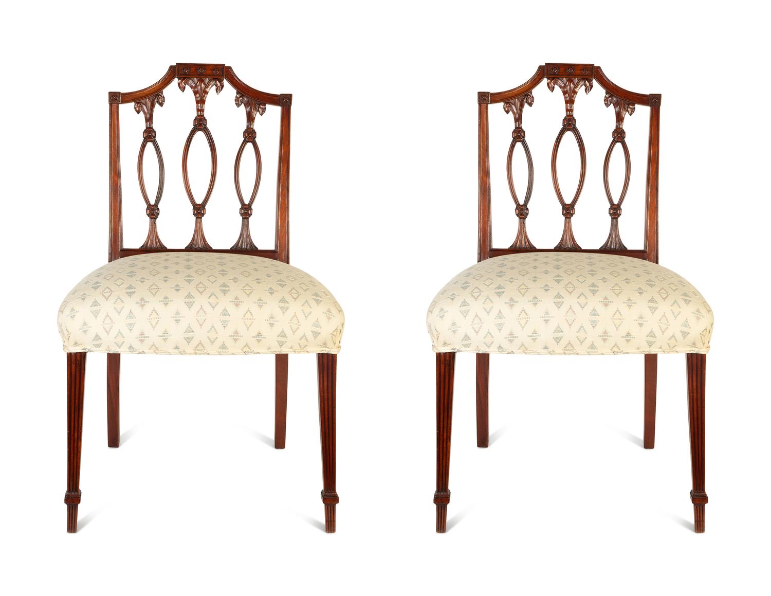 A Pair of Federal Carved Mahogany Side Chairs