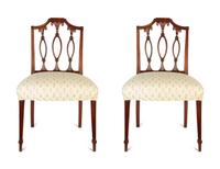 A Pair of Federal Carved Mahogany Side Chairs