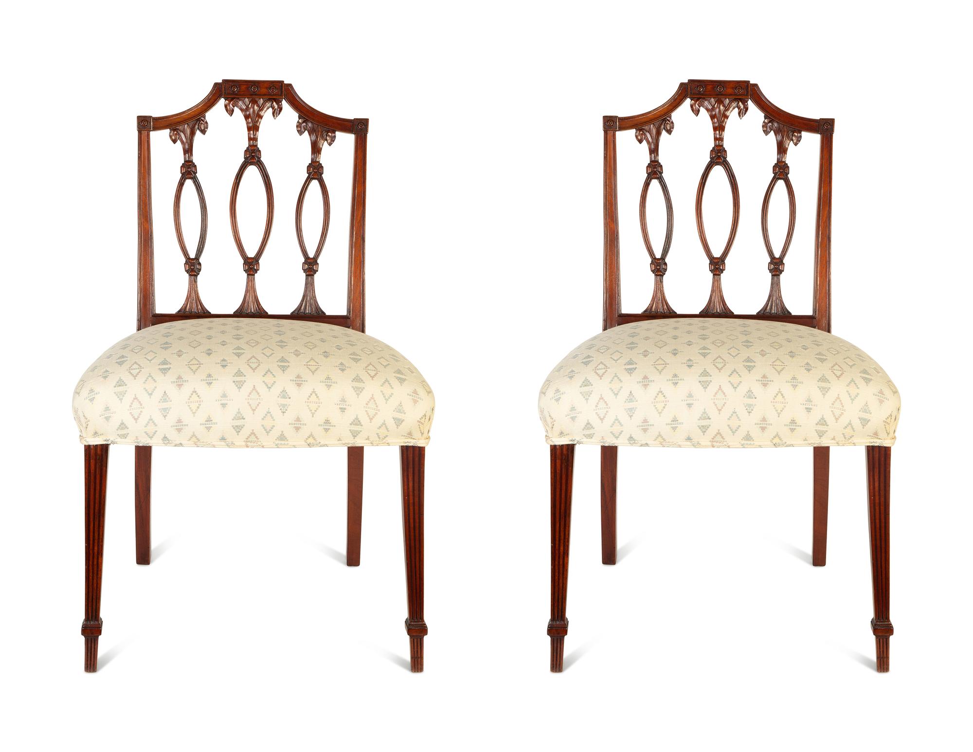 A Pair of Federal Carved Mahogany Side Chairs
